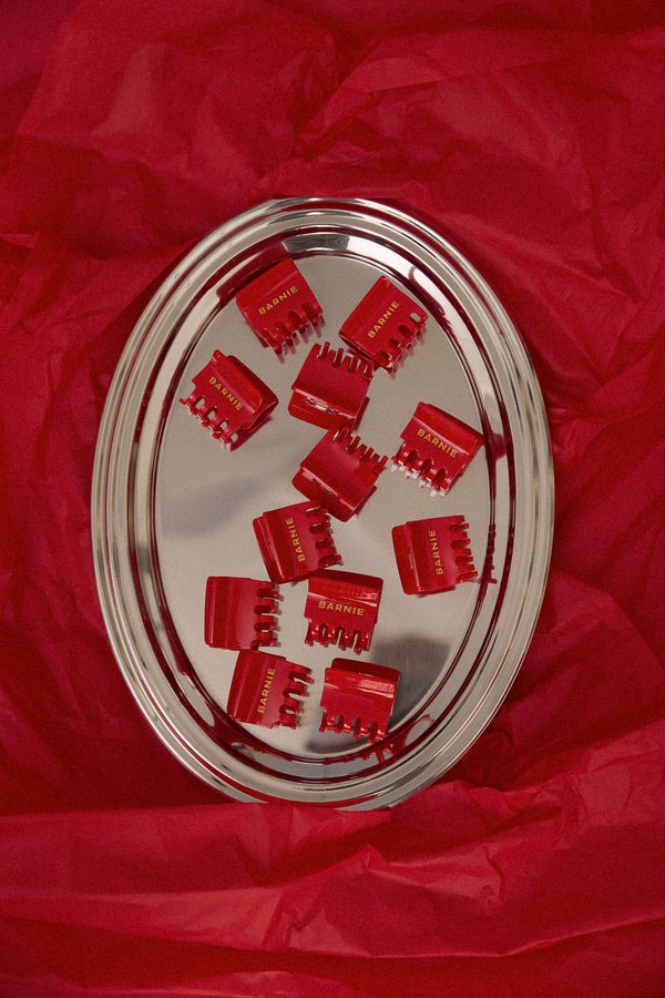 Pince à cheveux rouge